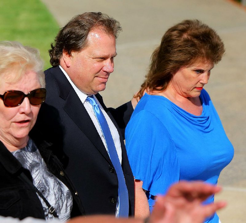 Ted Suhl leaves the federal courthouse in Little Rock with family members after the first day of his bribery trial in which jurors heard conversations recorded on a federal wiretap. 