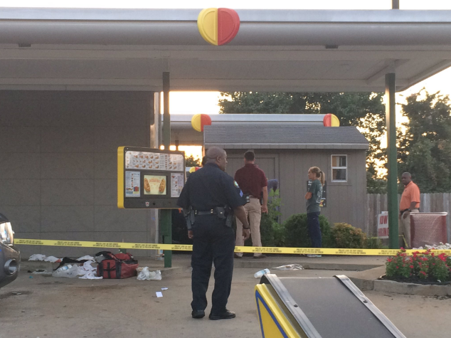 Police investigate a shooting at a Little Rock Sonic Drive-In on in this July 13, 2016 photo.