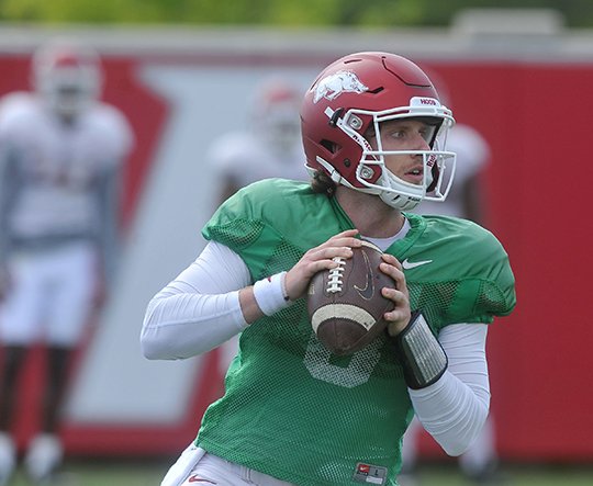 NWA Democrat-Gazette/Michael Woods STEPPING UP: Austin Allen, here pictured during spring practice at the University of Arkansas, replaces graduated brother Brandon as the Razorbacks' starting quarterback. Arkansas opens the season Sept. 3 against Louisiana Tech at Reynolds Razorback Stadium in Fayetteville.