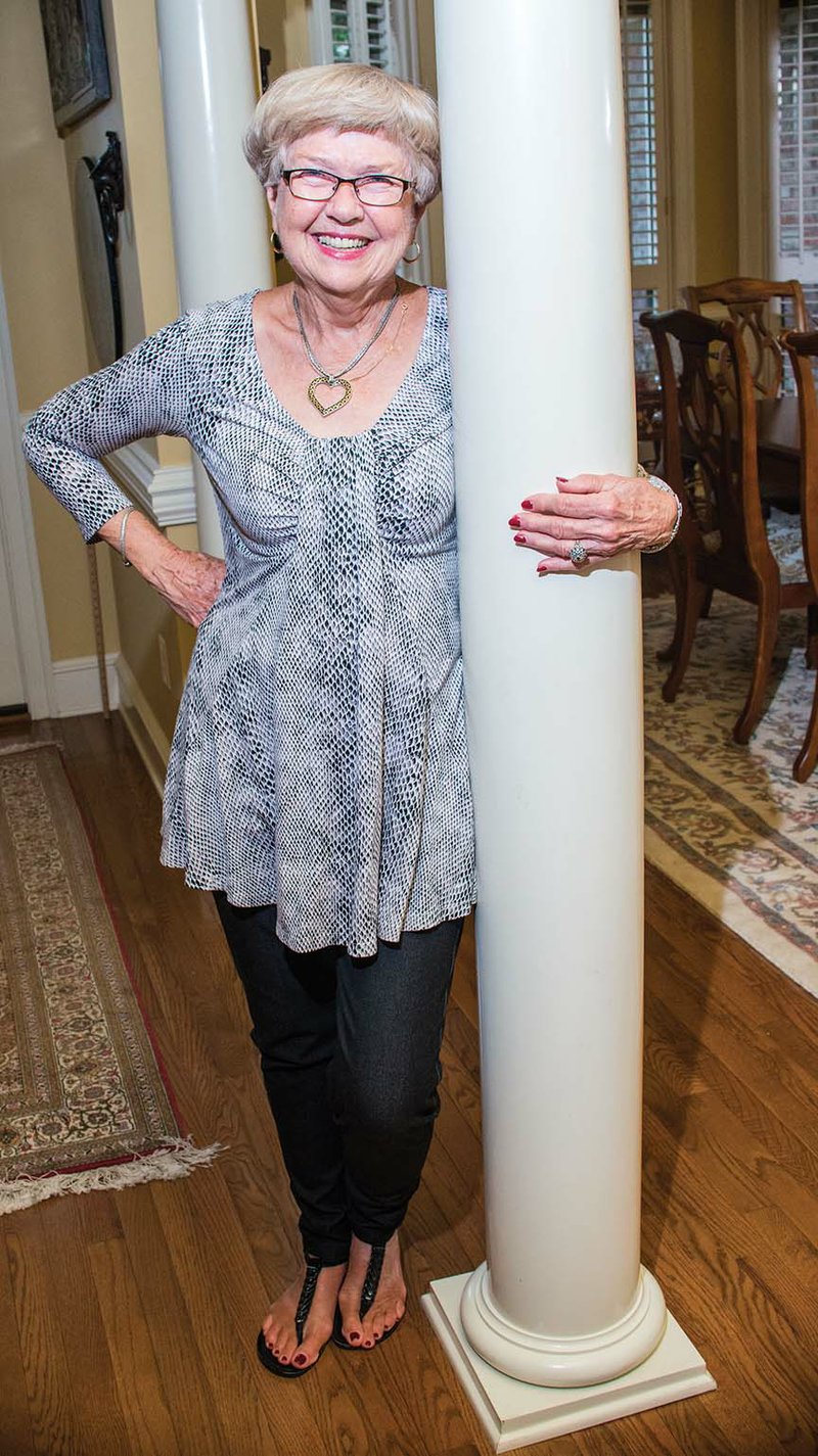 Joyce Miller stands by a column in the foyer of her home in Conway. Miller, one of the original board members of the Boys & Girls Club of Faulkner County, will be honored by the nonprofit organization at its fundraiser July 28 for her longtime support. Bill Hegeman of Conway, who chaired a capital campaign to build the current facility, said the honor is “certainly well-deserved.”