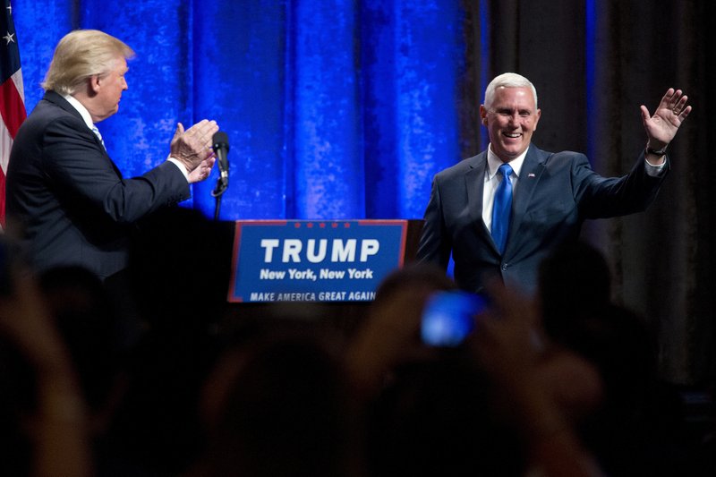 Republican presidential candidate Donald Trump, left, introduces Gov. Mike Pence, R-Ind., during a campaign event to announce Pence as the vice presidential running mate on, Saturday, July 16, 2016, in New York. Trump called Pence &quot;my partner in this campaign&quot; and his first and best choice to join him on a winning Republican presidential ticket. (AP Photo/Mary Altaffer)