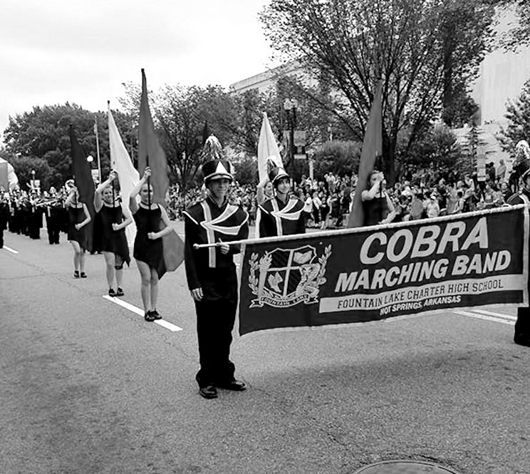 Submitted photo The marching Fountain Lake Cobra Band performed along Constitution Avenue in the National Independence Day Parade in Washington, D.C. U.S. Sen. Tom Cotton, R-Ark., recognized Patrick Combs, Cobra Band director, as the "Arkansan for the Week" during a speech on the Senate floor.