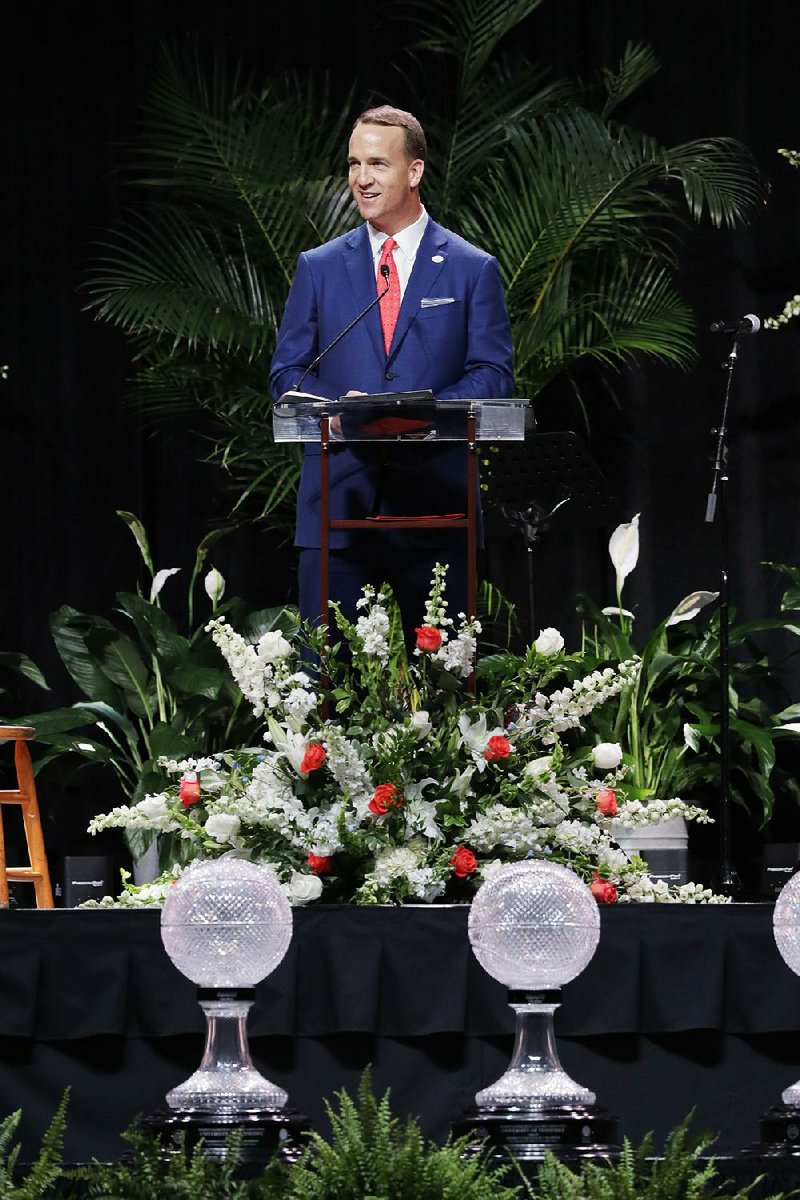 Former NFL and University of Tennessee quarterback Peyton Manning speaks during a ceremony to celebrate the life of former Tennessee women's basketball coach Pat Summitt Thursday, July 14, 2016, in Knoxville, Tenn. Summitt died June 28 at the age of 64. 