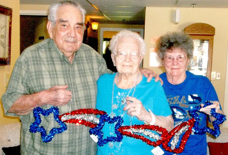 Photo submitted Concordia Catered Living recently held its sixth annual Wet T-Shirt Contest, where contestants throw wet men&#8217;s T-shirts from one laundry basket to another that&#8217;s 6 feet away. The winners &#8212; those who sunk the most T-shirts in the fastest time &#8212; were, from left, Bill Reece, first place; Fran Kuznia, second place; and Beverly Monture, third place.