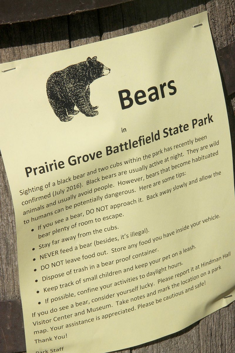 LYNN KUTTER ENTERPRISE-LEADER This is one of many flyers posted at Prairie Grove Battlefield State Park to warn visitors about the possibility of bears in the area.