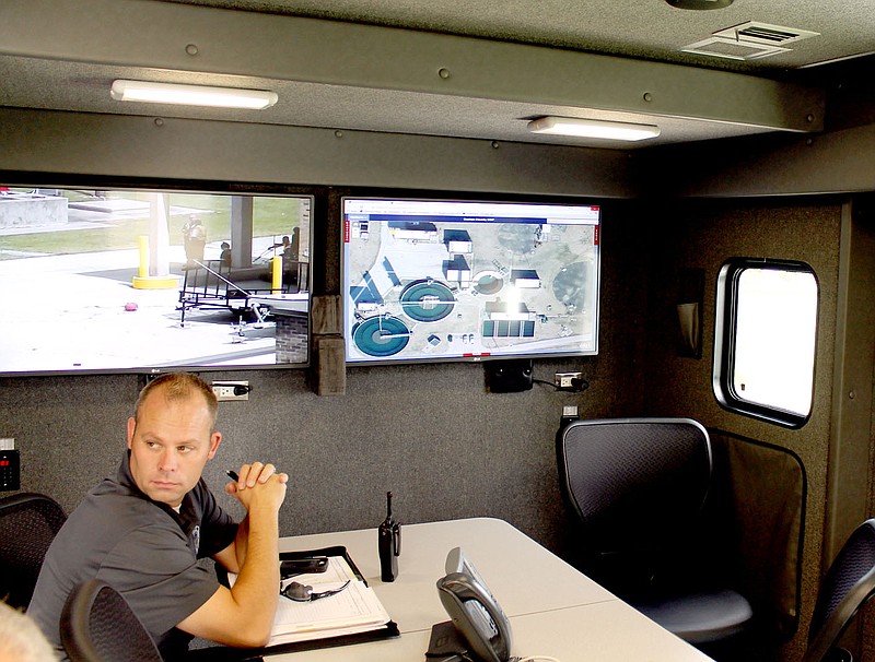 Michael Burchfiel/Siloam Sunday From the Benton County Command Center, dispatchers had a view of the action and could see where different teams were located.