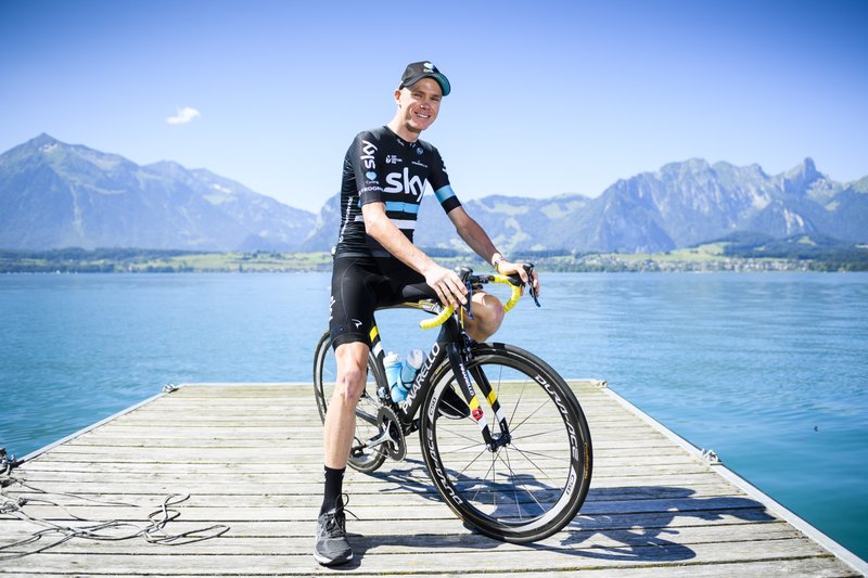 Current leader Chris Froome from Britain poses for a picture in front of the swiss alps at the shore of lake Thun on the rest day before the seventeenth stage of the Tour de France cycling race over 209km between Bern and Finhaut in Switzerland, in Hilterfingen,Switzerland Tuesday, July 19, 2016. 