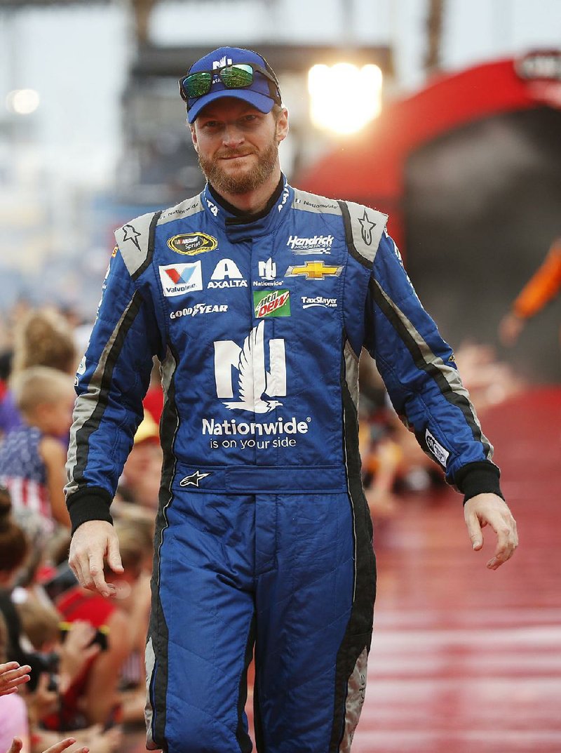 Dale Earnhardt Jr., is shown during driver introductions before the start of the NASCAR Sprint Cup auto race at Daytona International Speedway, Saturday, July 2, 2016, in Daytona Beach, Fla. 