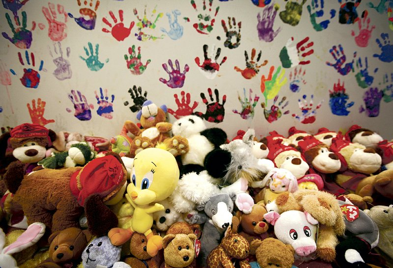 Each client is given a stuffed toy and leaves a painted handprint on the walls of the Children’s Safety Center in Springdale. There are more than 6,500 handprints on the walls of the nonprofit organization which started in 1997. The Dream Big Gala o