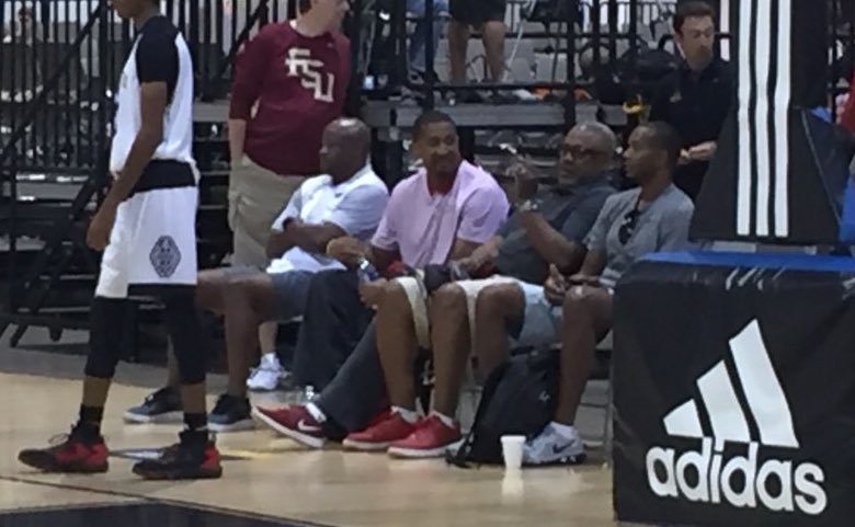 Arkansas Coach Mike Anderson, assistant Scotty Thurman and associate head coach Melvin Watkins watch the 16-under Arkansas Hawks in Vegas.  