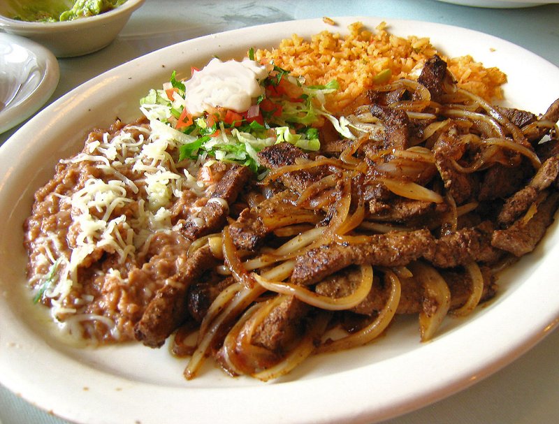 The Higado Encebollado at La Casa Real in North Little Rock is an entree of marinated grilled liver served with rice, beans, tortillas and pico de gallo.
