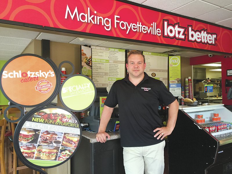 J.J. Ramsey, who owns three Schlotzsky&#8217;s in Northwest Arkansas with his wife, Hortencia, stands inside the popular Fayetteville location on N. College Blvd.