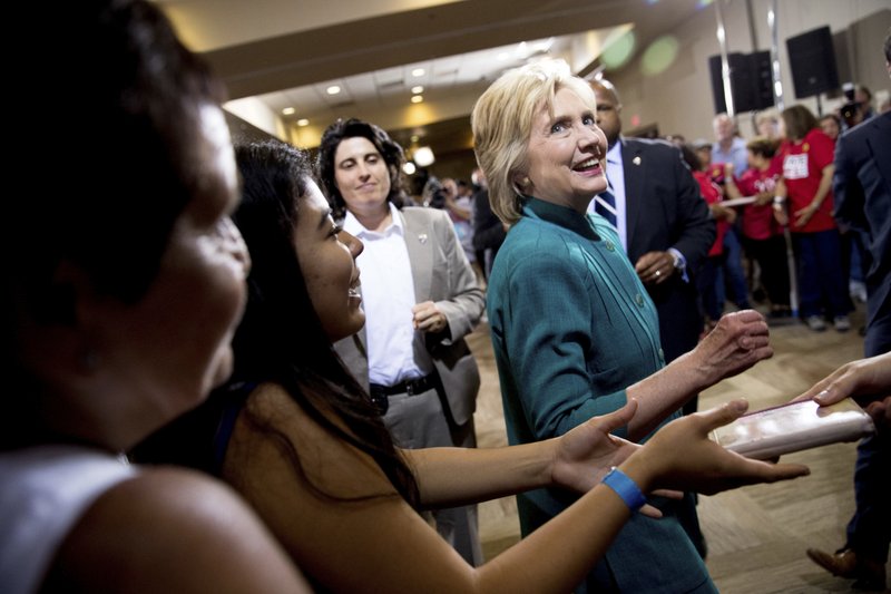 Democratic presidential candidate Hillary Clinton greets supporters after speaking at a rally at the Culinary Academy of Las Vegas in Las Vegas, Tuesday, July 19, 2016. (AP Photo/Andrew Harnik)