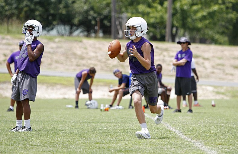 Terrance Armstard/News-Times Barton's Eli Shepherd gets ready to throw a pass against Camden during a junior high 7-on-7 football tournament on Friday. El Dorado's freshman squad topped Magnolia to win the championship.