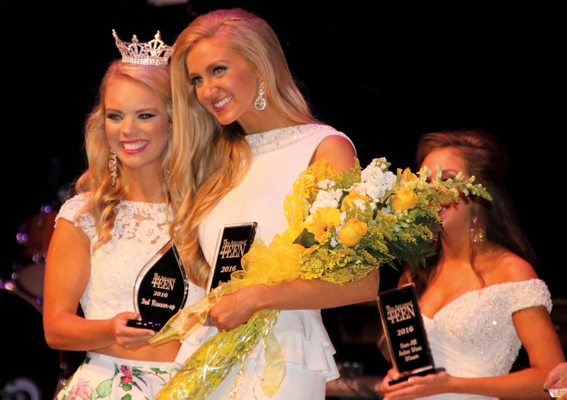 Miss Arkansas Outstanding Teen 2015 Gracie Stover, left, congratulates Miss Greater Hot Springs Mady Rottinghaus as third runner-up in the 12th annual Miss Arkansas Outstanding Teen pageant.