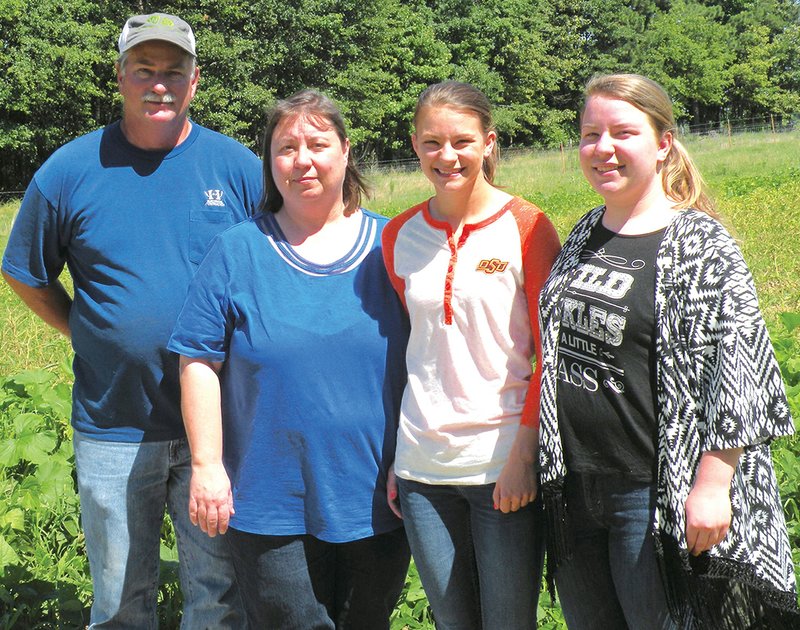 The Chris Hale family of Sheridan is the 2016 Grant County Farm Family of the Year. Family members include, from left, Chris, Elizabeth, Juliann and Rebekah. They raise a variety of produce and livestock.
