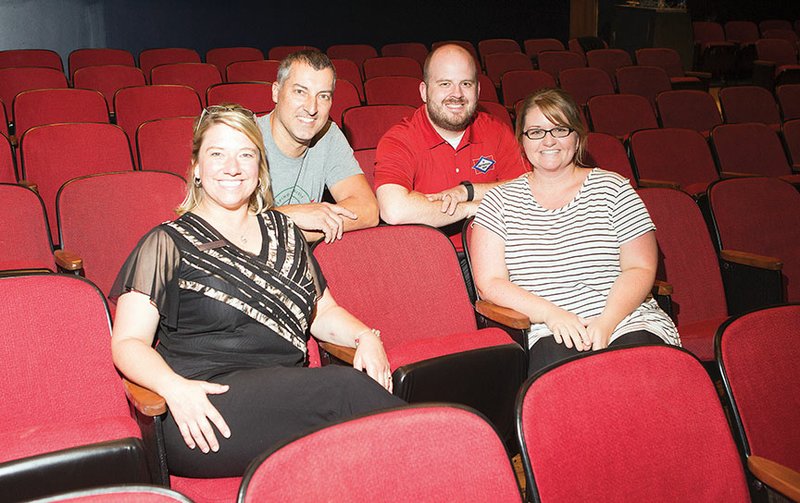 Janelle and Joe Shell, from left, and Adam and Mandi Curtwright co-own Batesville’s historic Melba Theater. Next month, the theater will host its red-carpet-themed grand opening.