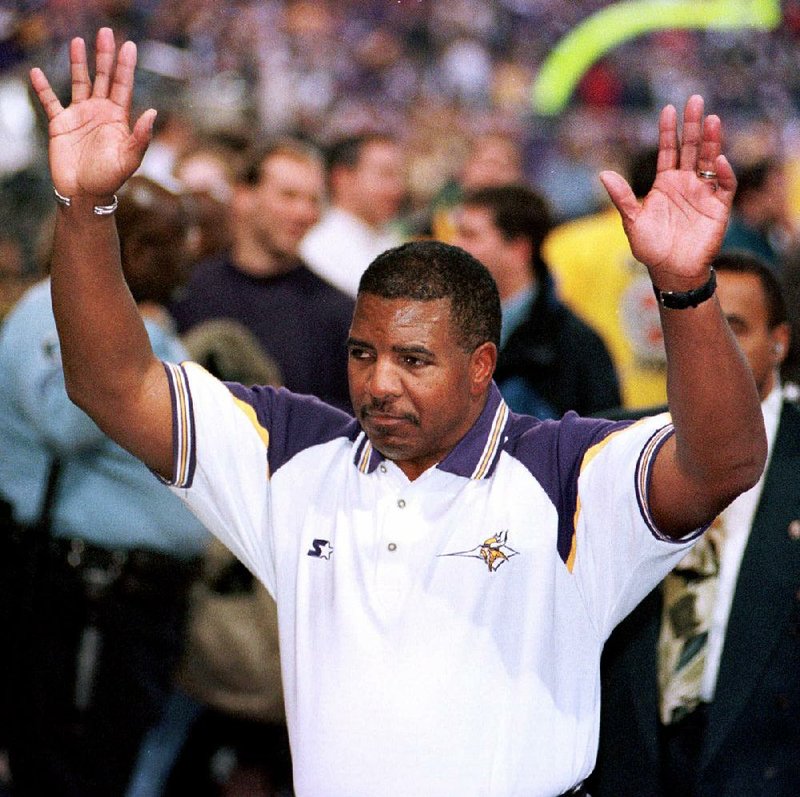 In this Jan. 10, 1999, file photo, Minnesota Vikings coach Dennis Green gestures after the Vikings beat the Arizona Cardinals 41-21 in a divisional playoff game, in Minneapolis. 