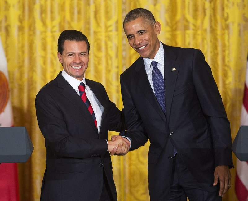 President Barack Obama and Mexican President Enrique Pena Nieto wrap up a news conference Friday at the White House, where Obama said the two countries are neighbors and friends.