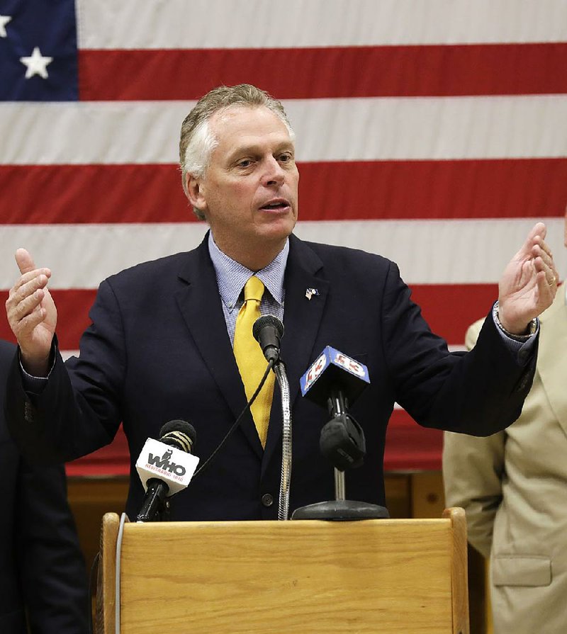 Virginia Gov. Terry McAuliffe speaks during a news conference 