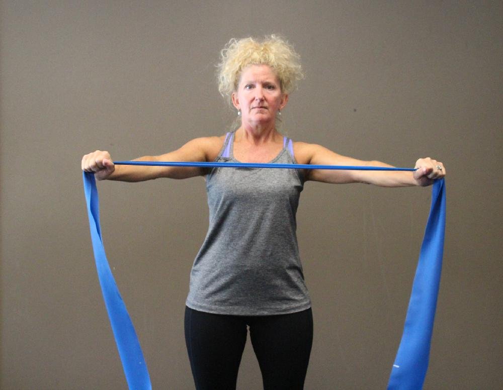 Stretch band exercise builds upper back muscles