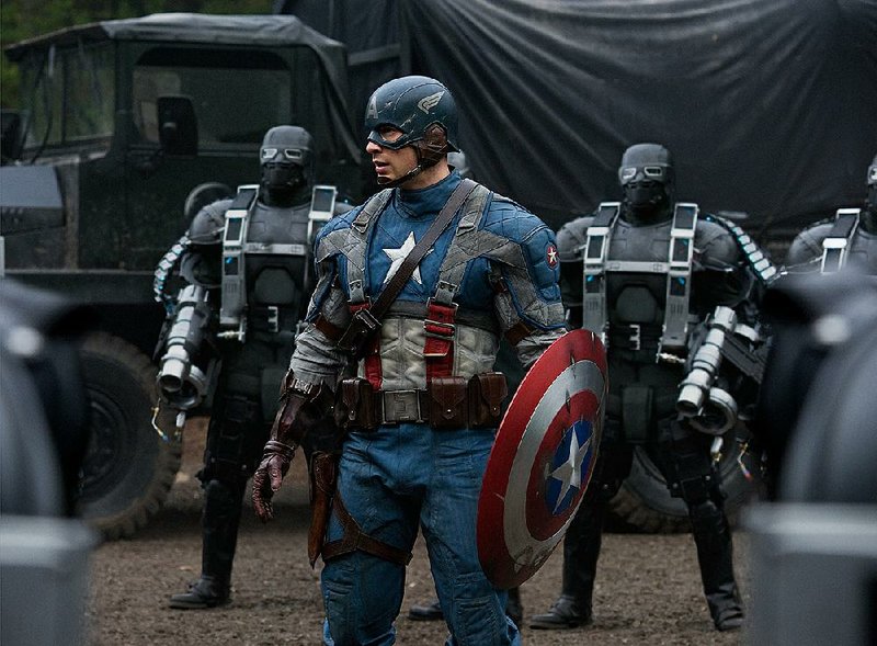 Captain America (Chris Evans, center), surrounded by HYDRA Soldiers in CAPTAIN AMERICA: THE FIRST AVENGER