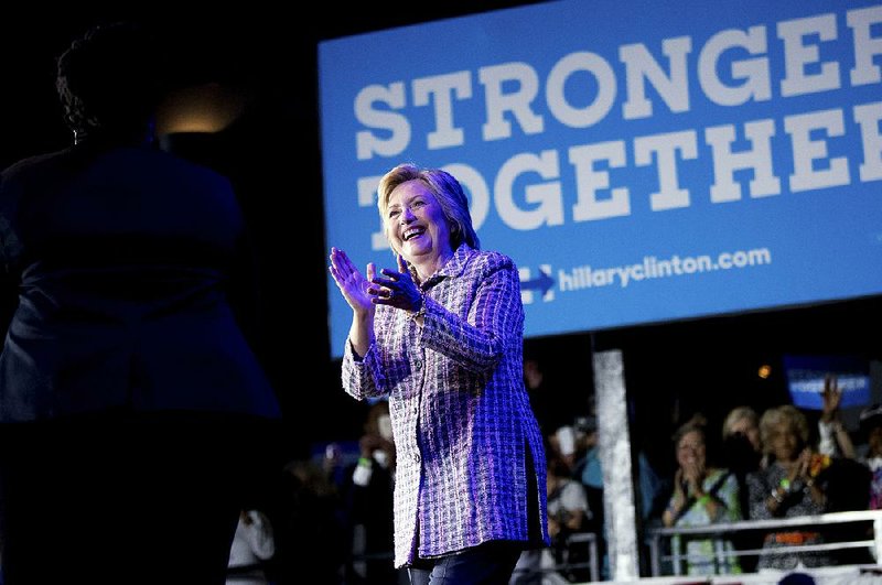 Democratic presidential candidate Hillary Clinton arrives to speak to volunteers at a Democratic party organizing event at the Neighborhood Theatre in Charlotte, N.C., Monday, July 25, 2016. (AP Photo/Andrew Harnik)