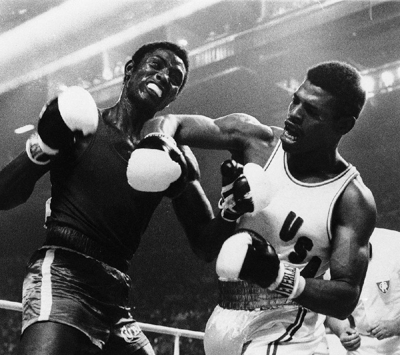 American Leon Spinks (right) fights against Cuba’s Sixto Soria in the light-heavyweight gold medal boxing match at the 1976 Olympics in Montreal. In the Rio de Janeiro Games next month, Olympic boxers will not wear protective headgear for the first time since 1980.