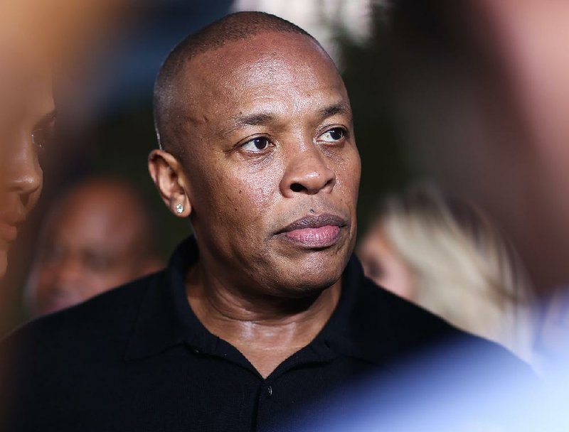 In this Aug. 10, 2015, file photo, Dr. Dre arrives at the Los Angeles premiere of "Straight Outta Compton." 