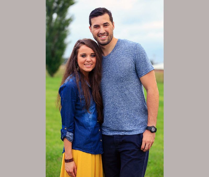 This undated image released by TLC shows Jinger Duggar, left, and former professional soccer player Jeremy Vuolo, stars of the reality series, "Counting On."