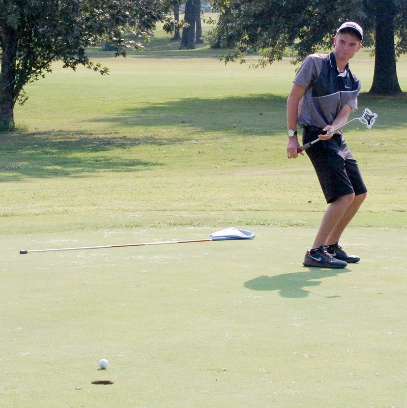 Graham Thomas/Herald-Leader Senior Cody Beyer watches a putt roll past the hole in a golf match last season. Beyer is expected to be one of Siloam Springs&#8217; top golfers in 2016.