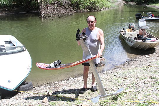 The Sentinel-Record/Colbie McCloud RIDING HIGH: Bucky Maynard, 72, of Pine Bluff, rides an Air Chair, a hydrofoil water ski, in the cove near Crystal Springs campground on Lake Ouachita.