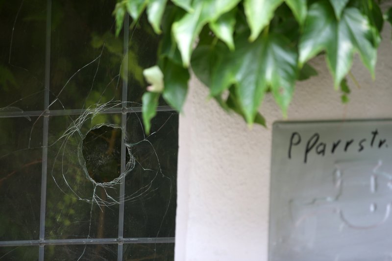 A broken window photographed at the site of the attack in Ansbach, Germany, Tuesday July 26, 2016. In the most recent attack in Germany, a 27-year-old Syrian asylum-seeker set off a backpack laden with explosives and shrapnel Sunday night after being refused entry to a crowded music festival in the Bavarian city of Ansbach, killing himself and wounding 15 people. 