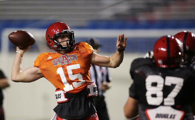 Arkansas State sophomore Justice Hansen (15), who started the Red Wolves spring game, is one of four quarterbacks on the roster who’ll vie for the starting job during fall workouts.