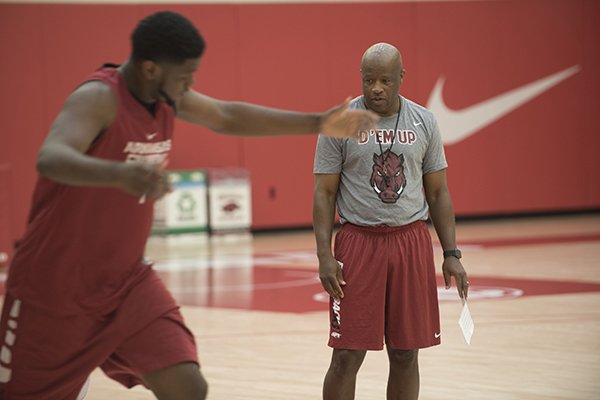 Arkansas coach Mike Anderson watches forward Trey Thompson during practice Monday, July 25, 2016, in Fayetteville. 