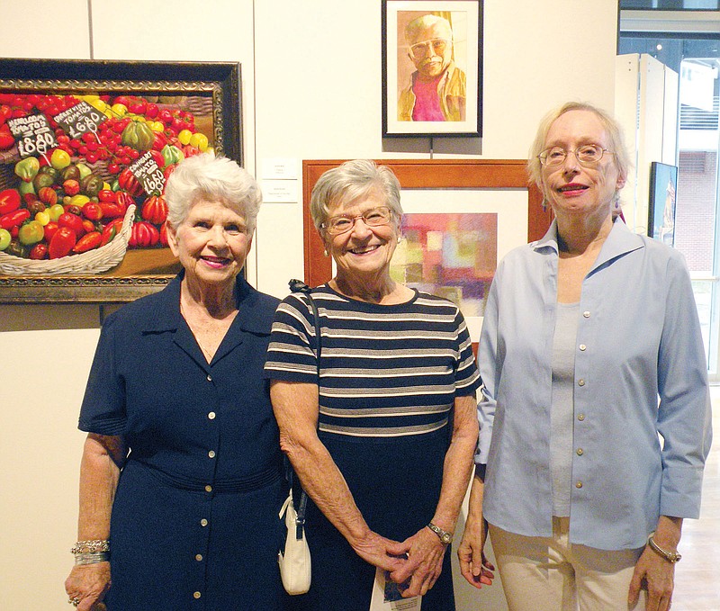 Several artists from the River Valley & Ozark Edition coverage area have work in the seventh annual Arkansas League of Artists Juried Exhibition at the Butler Center for Arkansas Studies in Little Rock. Among those attending the opening reception and awards ceremony July 8 are Coe Wilson of Morrilton, from left, Mary Ann Stafford of Maumelle and Suzanne Brugner of Heber Springs.