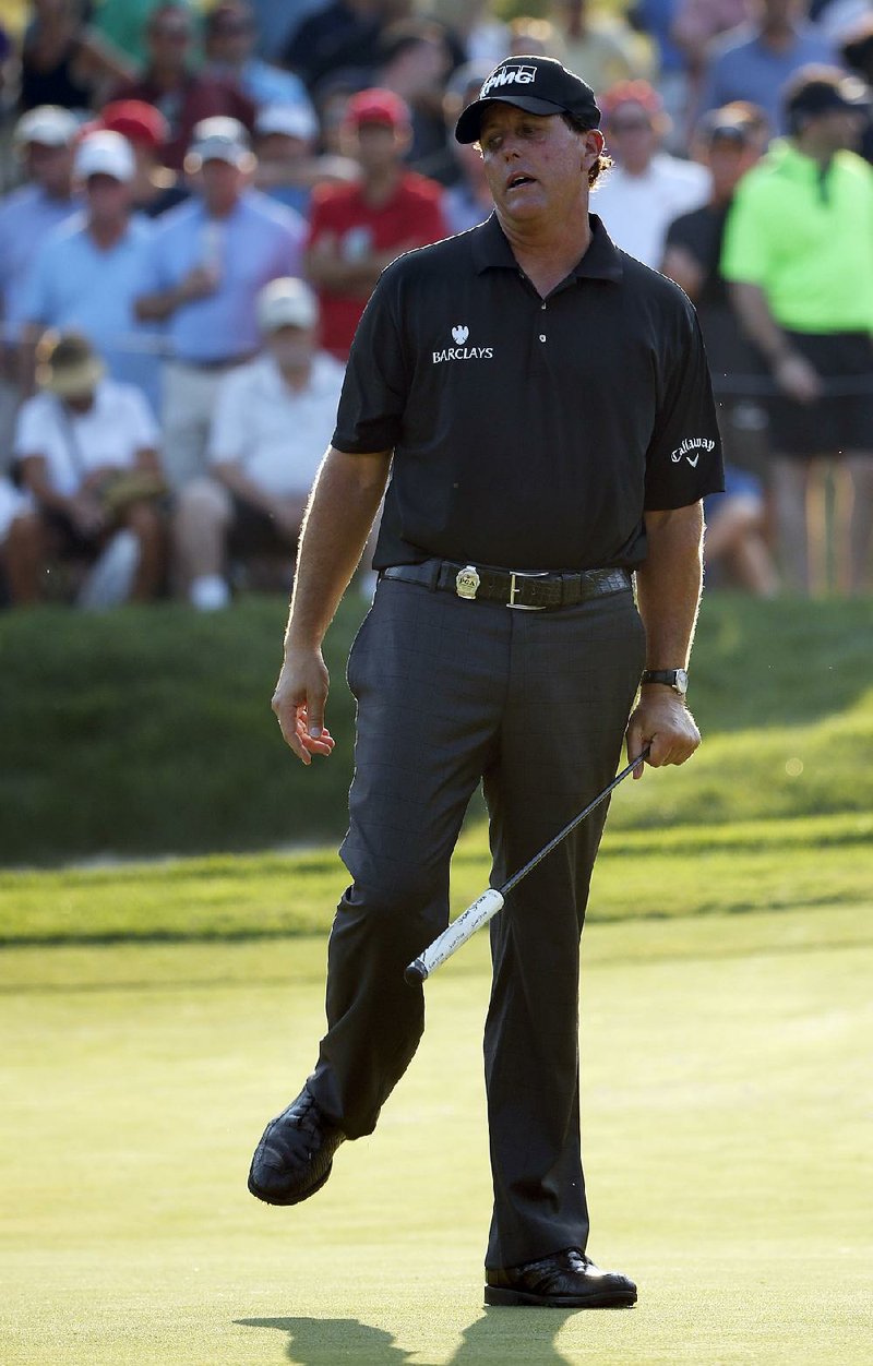 Phil Mickelson sent his tee shot on the first hole in Friday’s PGA Championship so far out of bounds that television cameras caught it bouncing on a nearby road and heading for thick ivy. The search became an adventure because there were other balls that ended up on that street, but none of them identified as Mickelson’s
ball.