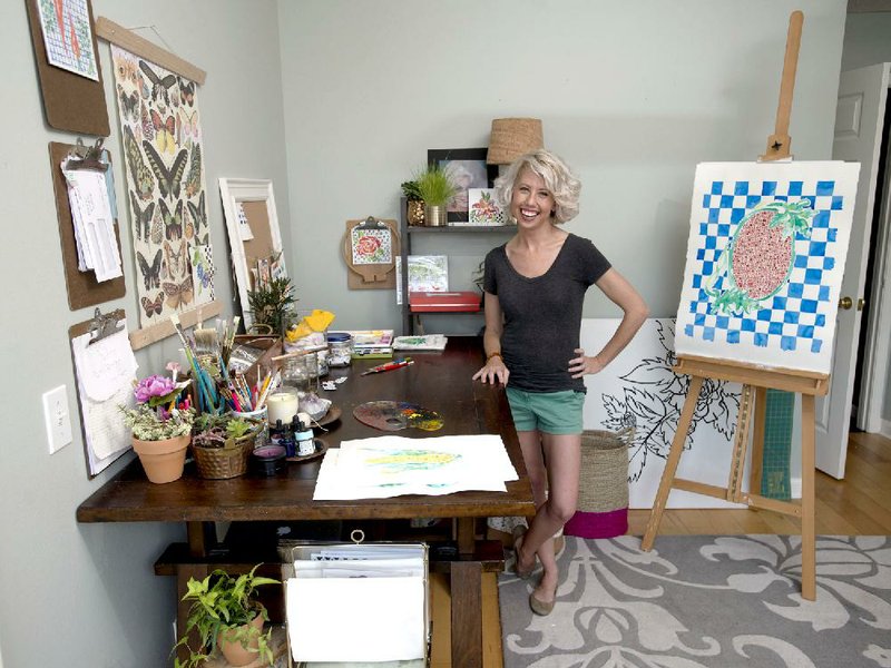 Paige Ray in her favorite space,her guest room/studio in her Rogers home. 