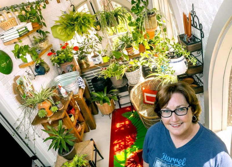 Lynn Baker in her favorite space, her garden room. 