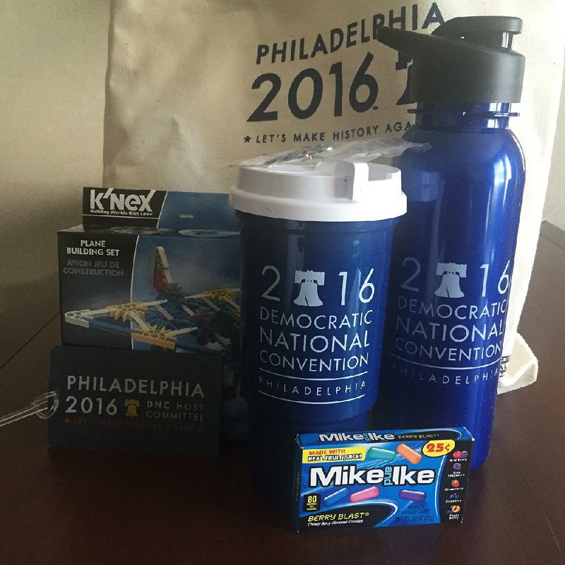 Visitors to the Democratic National Convention received water bottles, coffee cups and candy.