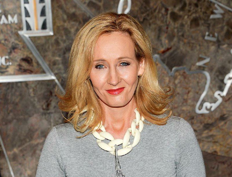 In this April 9, 2015 file photo, "Harry Potter" author J.K. Rowling lights the Empire State Building to mark the launch of her non-profit children's organization Lumos, in New York.  