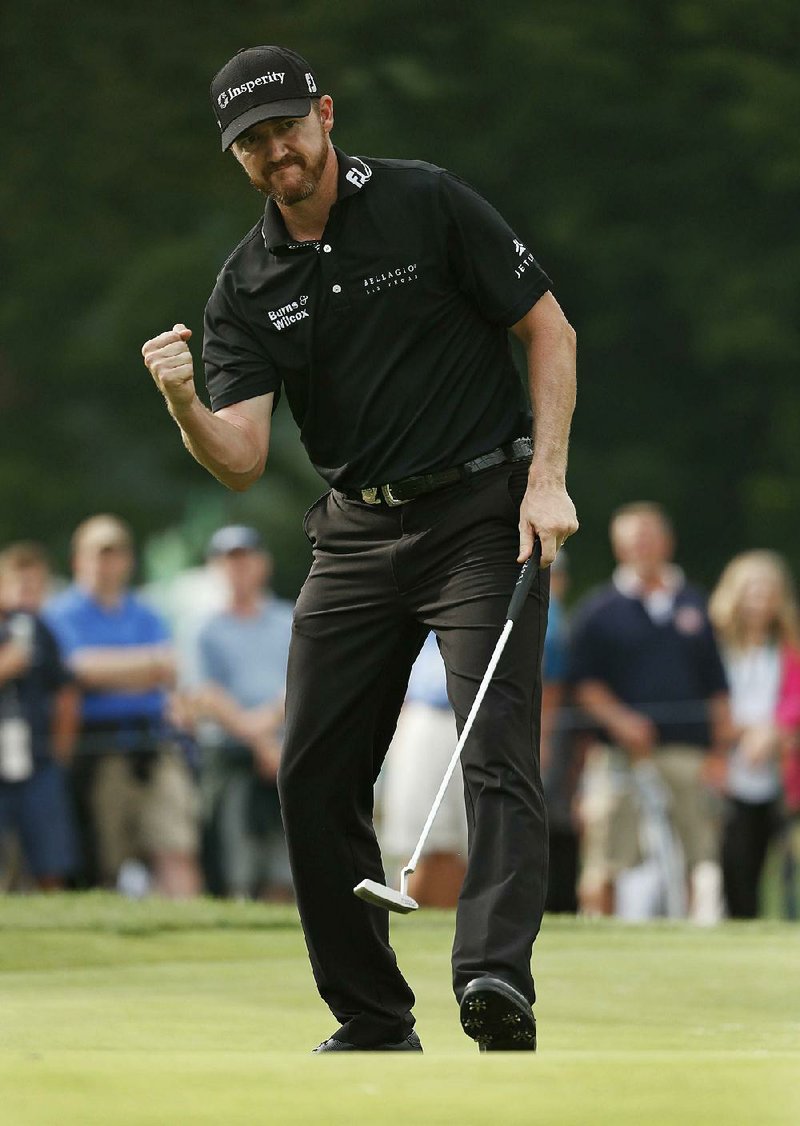 Jimmy Walker got the par he needed on the final hole to hold off Jason Day and grab a wire-to-wire victory in the PGA Championship on Sunday at Baltusrol Golf Club in Springfi eld, N.J. Day trailed by two stokes going into the final round but eagled No. 18 to pull within one shot of Walker, whose approach shot on the final hole went into the rough before he two-putted for par to win his first major title.
