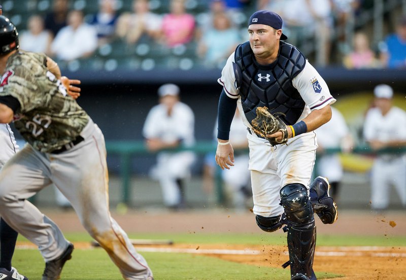 Naturals catcher Cam Gallagher chases down Arkansas&#8217; Wade Wass on Monday, Aug. 1, 2016, at Arvest Ballpark in Springdale.