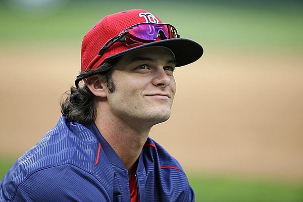 Boston Red Sox outfielder Andrew Benintendi looks around Safeco Field as he warms up before batting practice prior to the team's baseball game against the Seattle Mariners, Tuesday, Aug. 2, 2016, in Seattle. (AP Photo/Ted S. Warren)