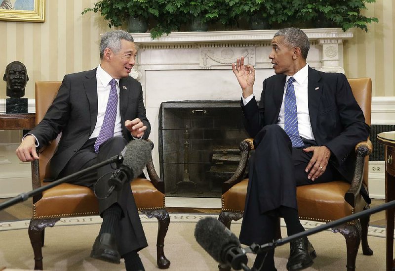 President Barack Obama meets with Singapore's Prime Minister Lee Hsien Loong in the Oval Office of the White House in Washington, Tuesday, Aug. 2, 2016. (AP Photo/Manuel Balce Ceneta)