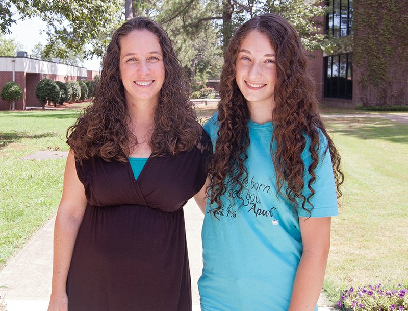 Kailee Metcalf, 16, right, said her mother, Shelley Metcalf, left, drew her to the Vanguard Senior Academy for Home School Students, presented by Arkansas State University-Beebe. The academy offers courses such as English, college algebra and biology to home-schooled high-schoolers. Kailee, a junior, will begin freshman English on Aug. 23.