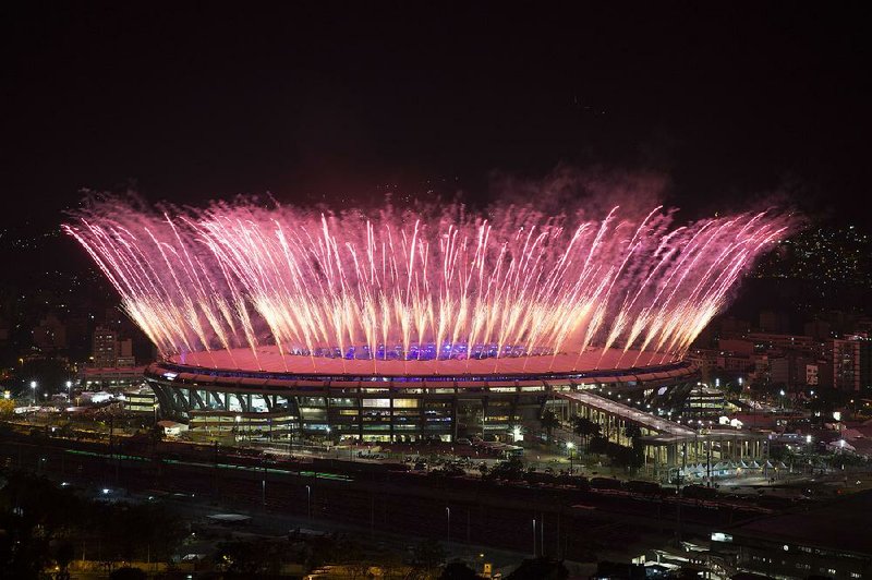 Fireworks explode above Maracana Stadium during the opening ceremony of the Olympics in Rio de Janeiro on Friday. In all, 206 nations and one refugee team will compete despite the city receiving criticism for venue construction, rising crime and health hazards pertaining to the Zika virus.