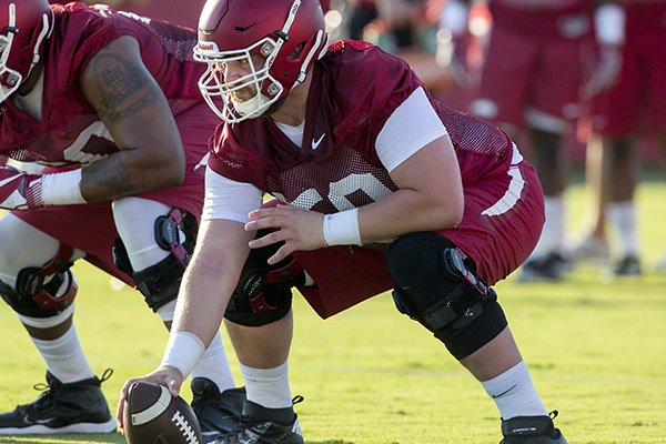 Arkansas offensive lineman Jake Raulerson goes through practice Thursday, Aug. 4, 2016, in Fayetteville. 