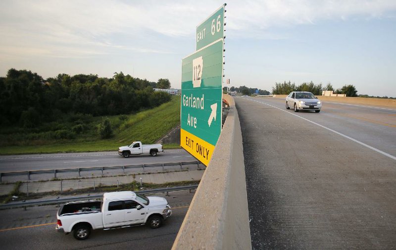 Morning traffic travels north and south Friday on Interstate 49 near the Arkansas 112 interchange in Fayetteville.