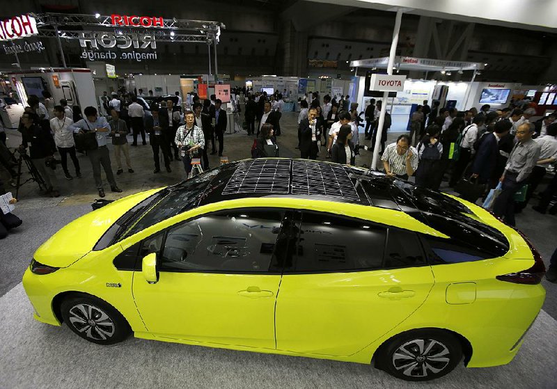 Toyota Motor Corp’s Prius PHV is displayed at the Smart Community Japan exhibition in Tokyo in June.
